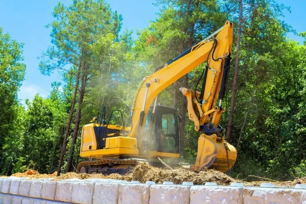 excavator on a retaining wall site